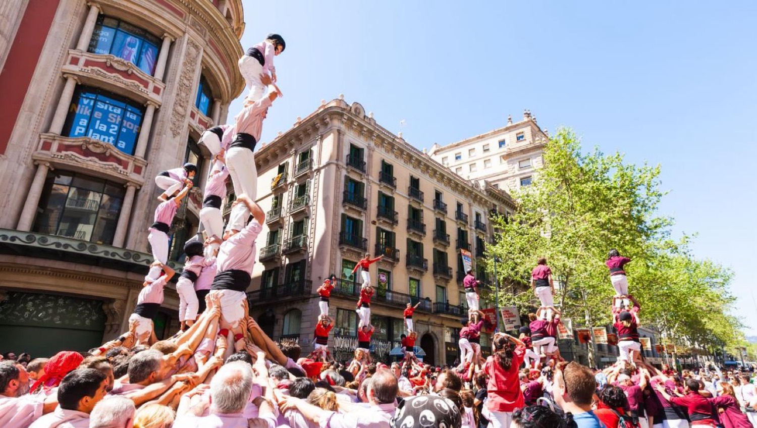 Castellers building a human tower in Barcelona